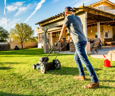 A man mowing a lawn